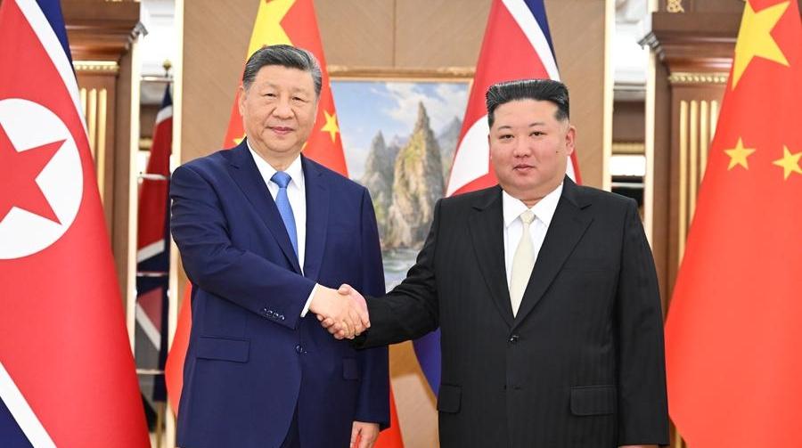 习近平同金正恩举行会谈